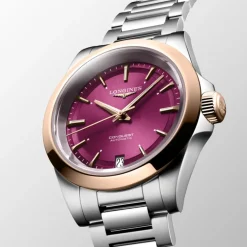 Longines Conquest 34mm L3.430.5.98.6 | Dame Dameure Med Lænke | Dameure I Bicolor